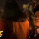 Guillermo looking at camera with Nandor and wives in the background